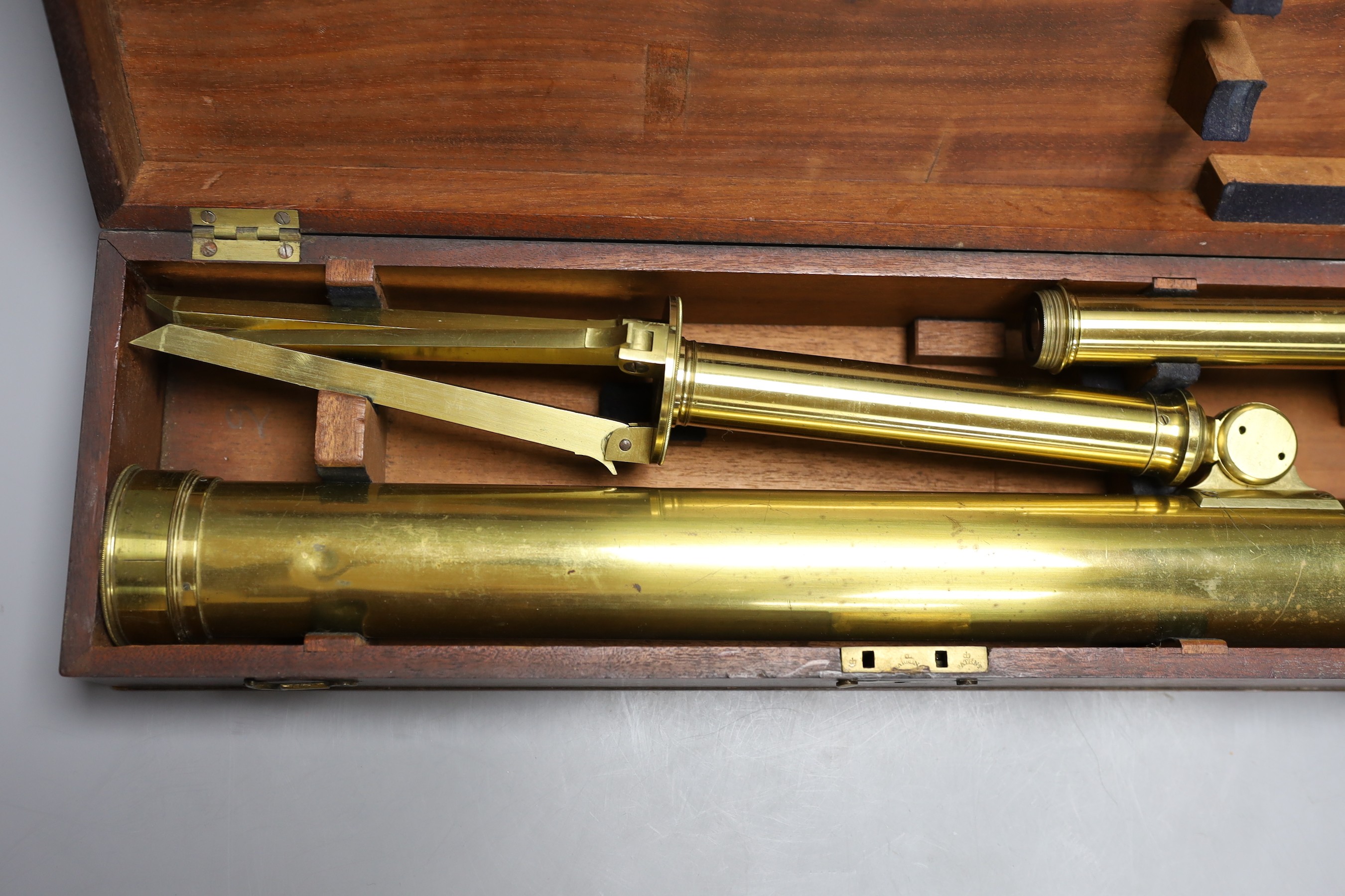 A cased set brass microscope
